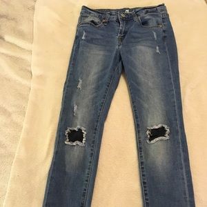 Ripped patched denim jeans